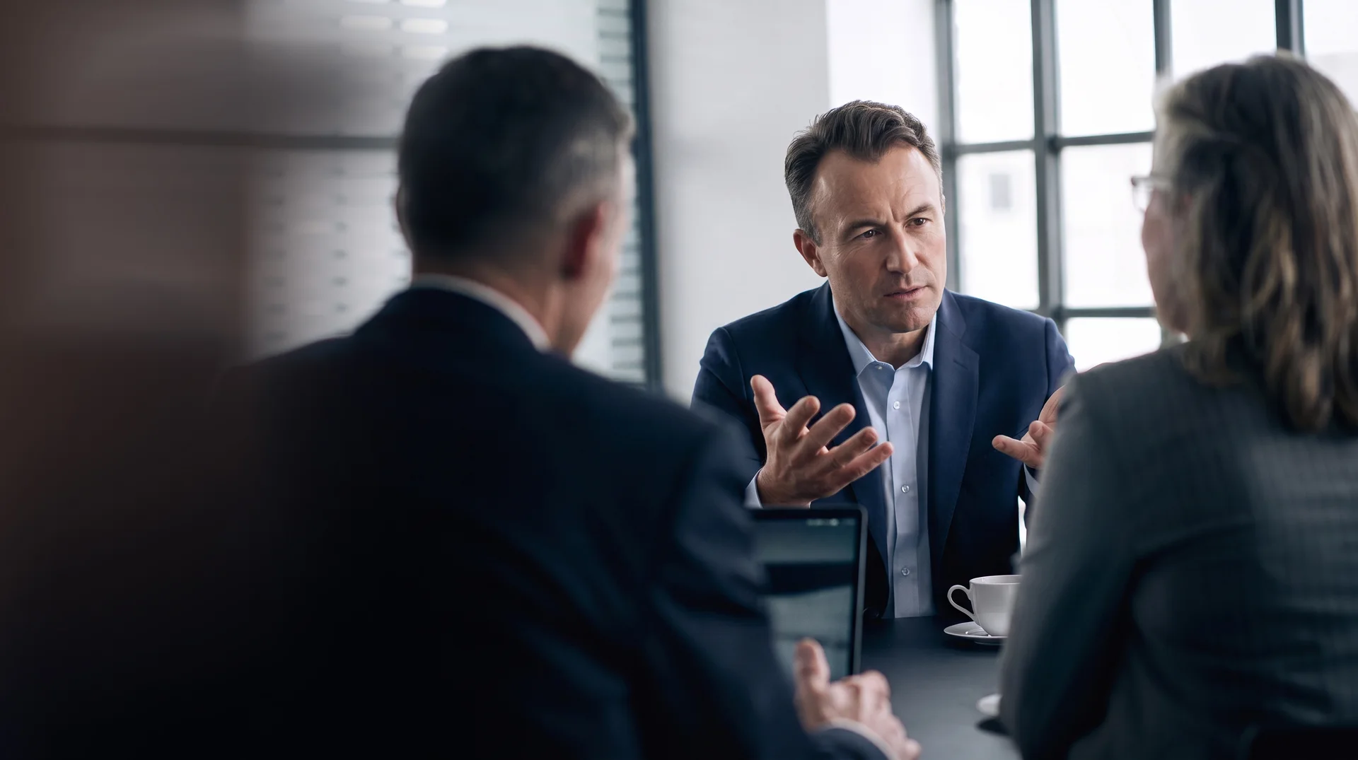 An Arch Capital adviser meeting with clients