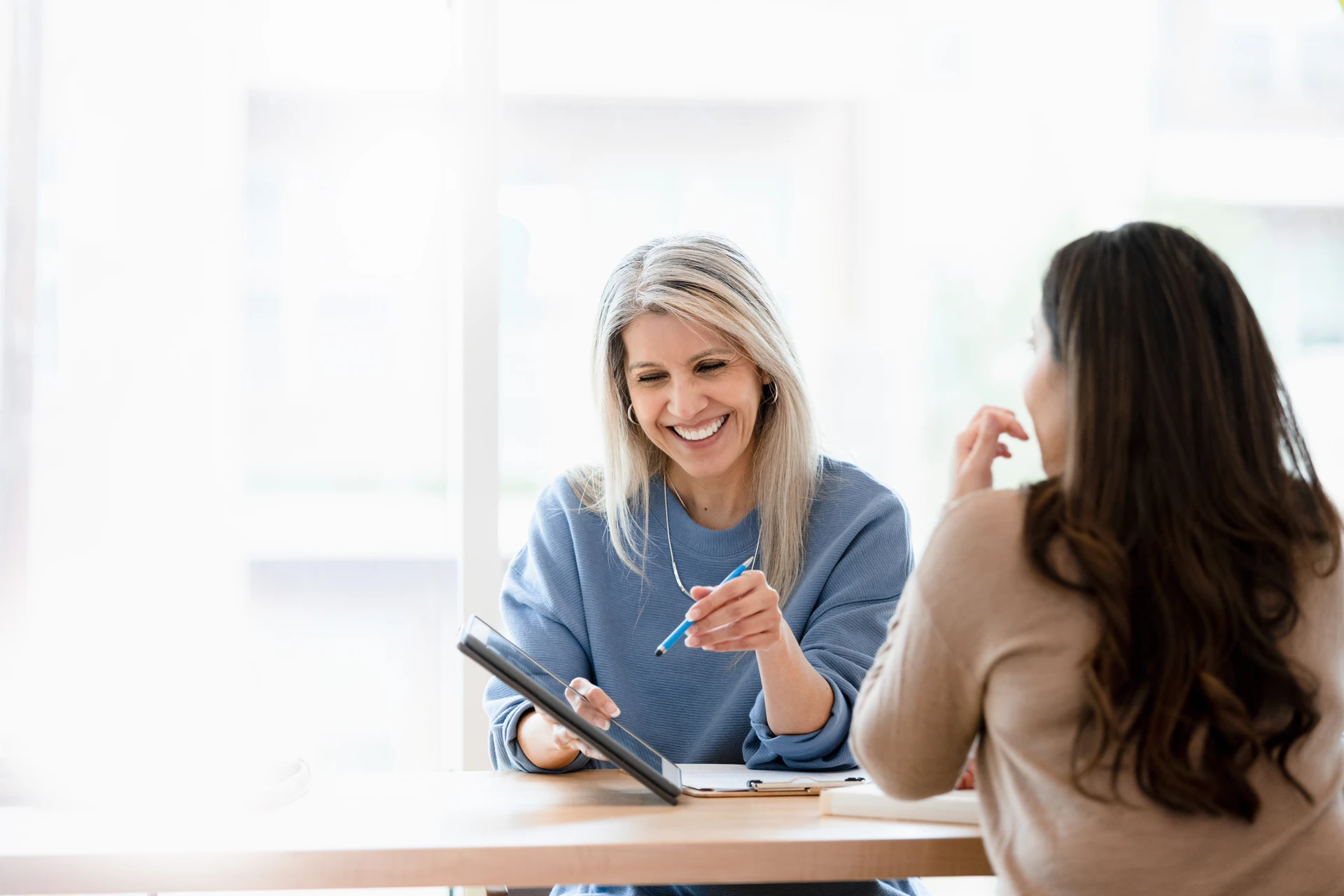 Adviser smiling with a client